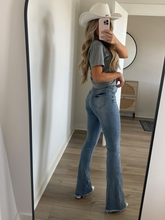 Load image into Gallery viewer, Sarah Distressed Medium Wash Flares