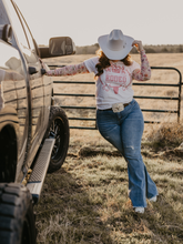 Load image into Gallery viewer, Sarah Distressed Medium Wash Flares