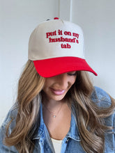 Load image into Gallery viewer, Put It On My Husbands Tab Trucker Hat