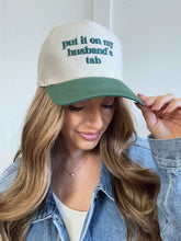 Load image into Gallery viewer, Put It On My Husbands Tab Trucker Hat