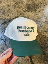 Load image into Gallery viewer, Put It On My Husbands Tab Trucker Hat
