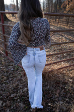 Load image into Gallery viewer, Lucy Asymmetrical Distressed Flare Jeans