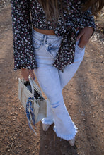 Load image into Gallery viewer, Lucy Asymmetrical Distressed Flare Jeans